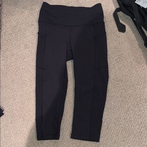 Lululemon black pants 3/4 zipper in back
